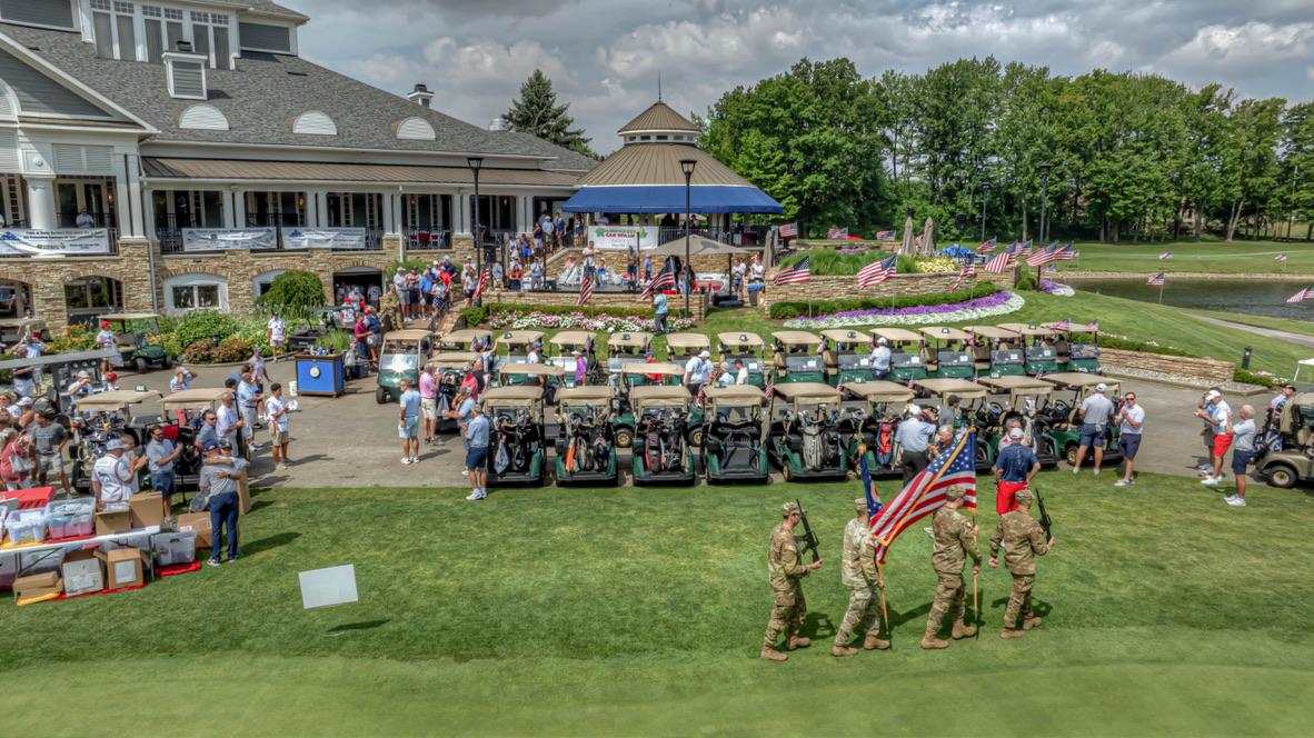 Patriot Classic opening ceremony — color guard and carts at Westwood